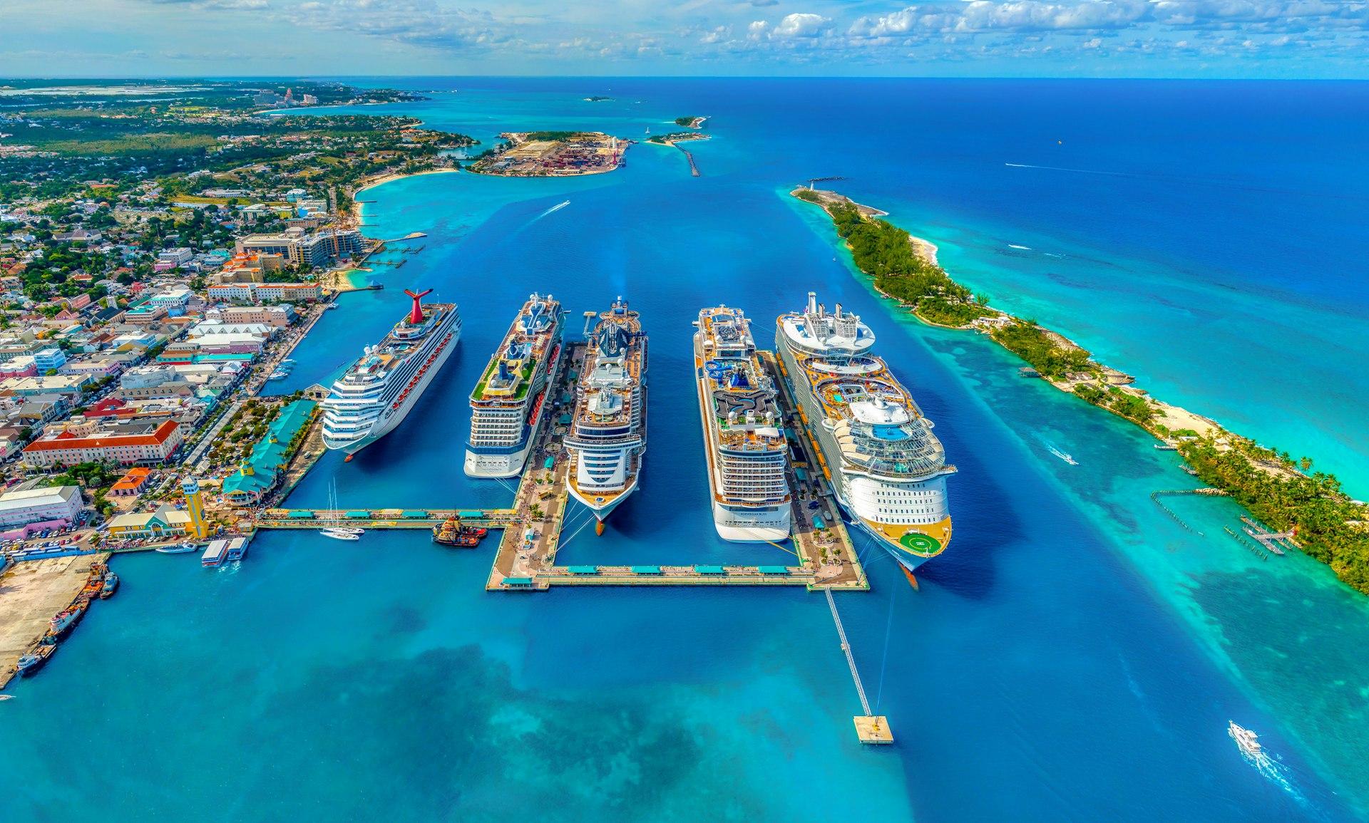 Aerial view of cruise ships at a Caribbean port with turquoise water